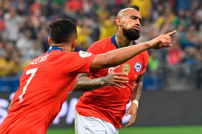 Chile's Arturo Vidal celebrates with teammates before his goal against Colombia was disallowed after a VAR consultation. AFP