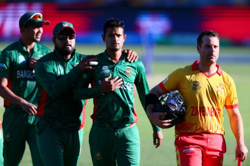 Ryan Burl walks off the field during the T20 World Cup match between Bangladesh and Zimbabwe at The Gabba on October 30, 2022 in Brisbane. AFP