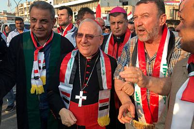 Cardinal Louis Raphael I Sako, patriarch of the Chaldean Catholic Church, visits Tahrir Square in Baghdad. AP