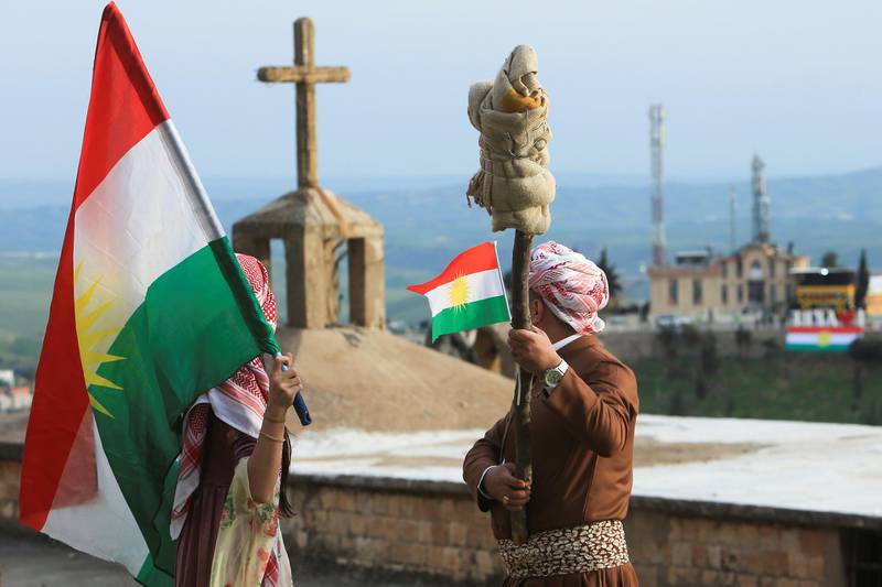 People holding Kurdish flags celebrate Nowruz in the town of Akra near Duhok, in Iraqi Kurdistan. Reuters