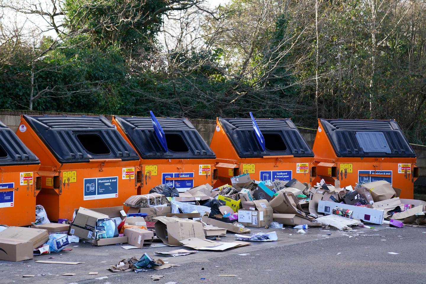 Rubbish waiting to be collected from a recycling centre in Birmingham. Covid-related staff shortages across England during the pandemic caused rubbish collection delays with some bins left overflowing. PA