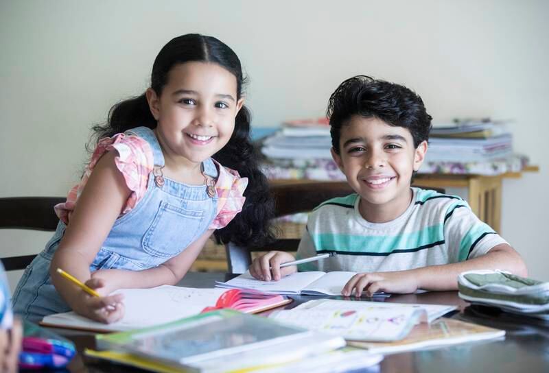Siblings Laila, 6, and Mourad, 8, are learning Arabic at home. Ruel Pableo for The National
