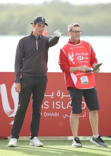 ABU DHABI, UNITED ARAB EMIRATES - JANUARY 21:   Amateur Josh Hill of England looks on with caddie during Day Two of the Abu Dhabi HSBC Championship at Yas Links Golf Course on January 21, 2022 in Abu Dhabi, United Arab Emirates. (Photo by Warren Little / Getty Images)