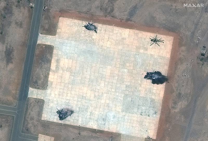 Satellite image shows a close-up view of destroyed helicopters in South Khartoum. Reuters