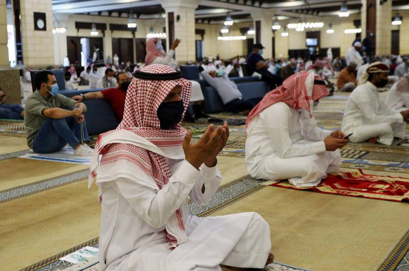 A Saudi man wearing a protective face mask performs the Friday prayers inside the Al Rajhi Mosque, after the announcement of the easing of lockdown measures amid the coronavirus disease in Riyadh, Saudi Arabia. REUTERS