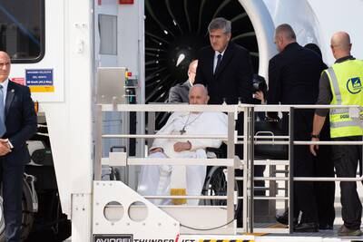The Pope's trip included a meeting with French President Emmanuel Macron. EPA
