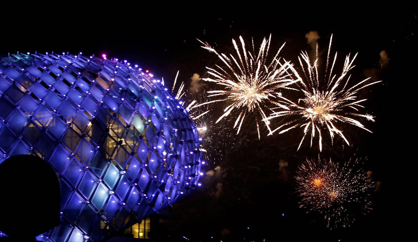 epa06812368 Fireworks illuminates the sky over the Yas Viceroy luxury hotel on the first day of the Muslim holiday of Eid Al-Fitr at the Marina on Yas Island, Abu Dhabi, United Arab Emirates, late 15 June 2018 (issued 16 June 2018). Muslims around the world are celebrating Eid al-Fitr, the three day festival marking the end of the Muslim holy month of Ramadan, it will be observed on 15th or 16th of June depending on the lunar calendar. Eid al-Fitr is one of the two major holidays in Islam.  EPA/ALI HAIDER
