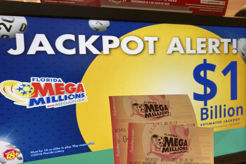 A giant Mega Millions lottery jackpot ballooned to $1.02 billion after no one matched all six numbers to win the top prize. AP