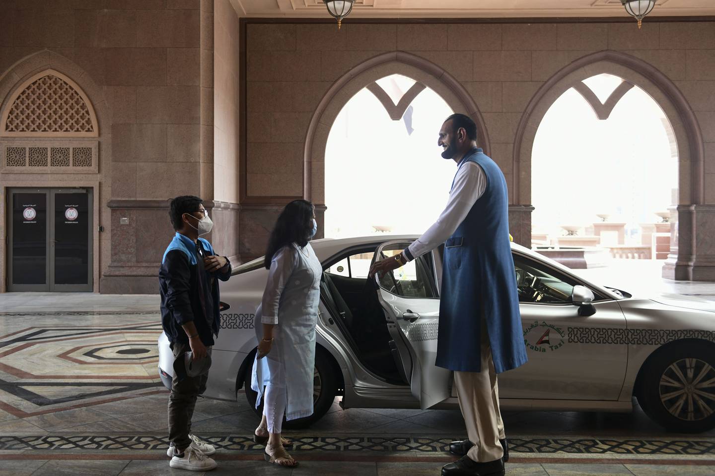 Abdul-Jabbar al-Fazar greets guests at the Emirates Palace.  Khushnum Bhandari / The National