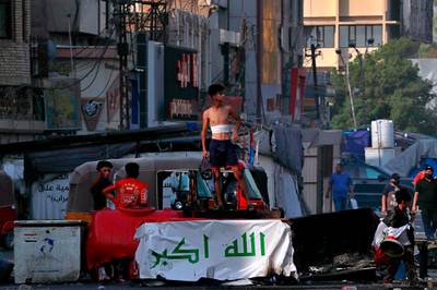 Fresh violence erupted between demonstrators and Iraqi security forces in central Baghdad on Monday. AP