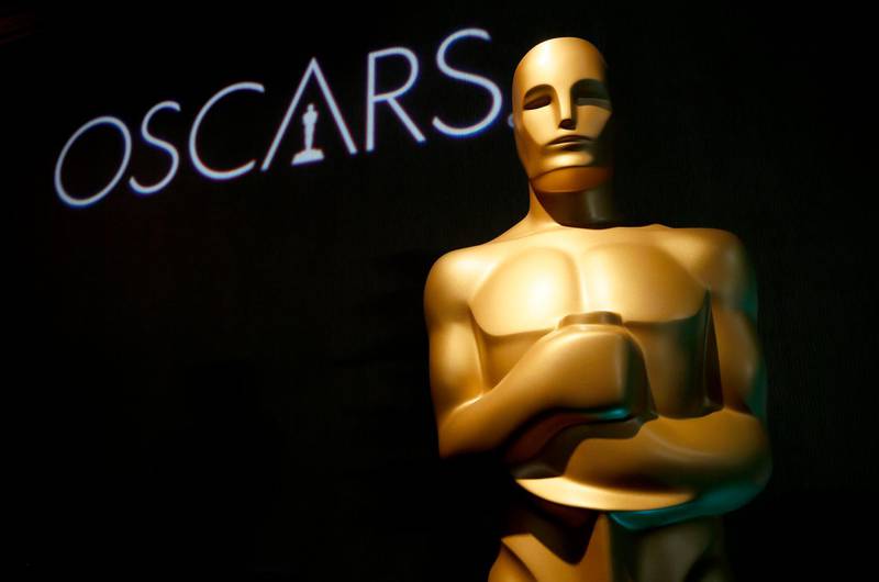 FILE - In this Feb. 4, 2019 file photo, an Oscar statue appears at the 91st Academy Awards Nominees Luncheon in Beverly Hills, Calif. The Oscars will not have a host for its annual awards show.  (Photo by Danny Moloshok/Invision/AP, File)