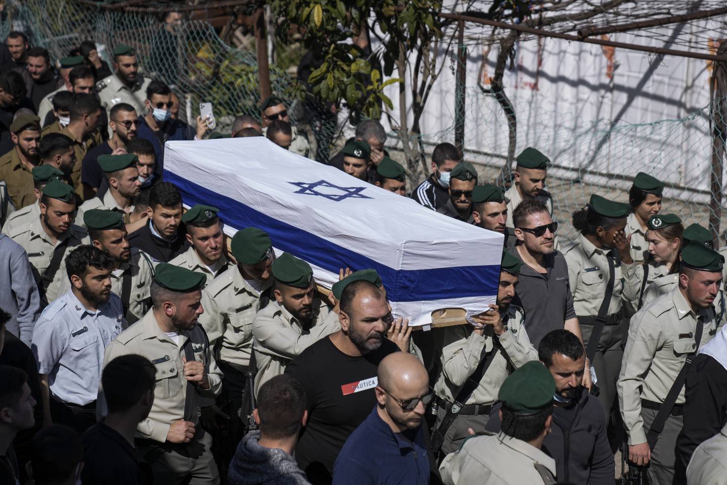 Border police carry the coffin of Israeli border officer Yezen Falah, 19, at his funeral in Kisra-Sumei, northern Israel, on Monday, in an attack for which ISIS claimed responsibility. AP