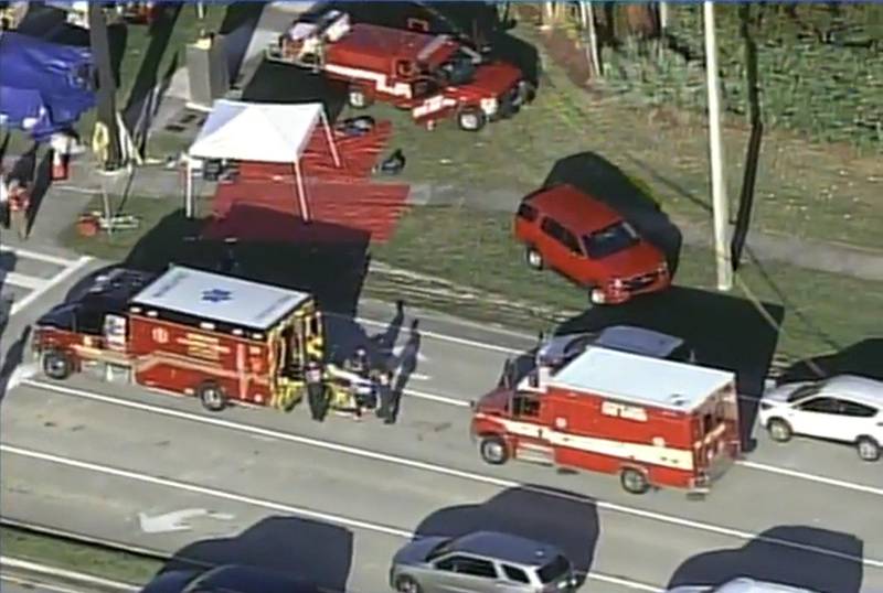 Rescue workers prepare to transport a victim on a stretcher near Marjory Stoneman Douglas High School following a shooting incident in Parkland, Florida, U.S. February 14, 2018 in this still image taken from a video. WSVN.com via REUTERS. ATTENTION EDITORS - THIS IMAGES HAS BEEN PROVIDED BY A THIRD PARTY. NO RESALES, NO ARCHIVES. MANDATORY CREDIT. NO ACCESS SOUTHEAST FLORIDA MEDIA.