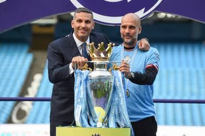Manchester City manager Pep Guardiola, right, celebrates with chairman Khaldoon Al Mubarak after being crowned 2022/23 Premier League champions. EPA