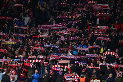 Atletico Madrid fans celebrate after the match. Reuters