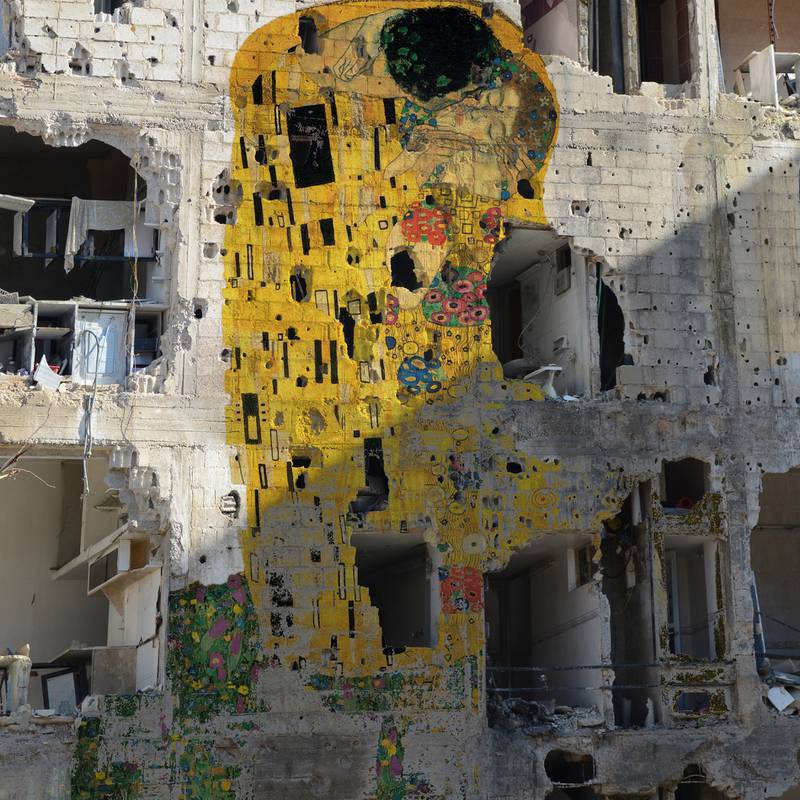 A handout photo of Freedom Graffiti, a work by Syrian artist Tammam Azzam who superimposed Gustav KlimtÕs The Kiss on to an image of a Syrian bomb site.  Tammam Azzam is represented by Ayyam Gallery www.ayyamgallery.com (Courtesy: Ayyam Gallery)