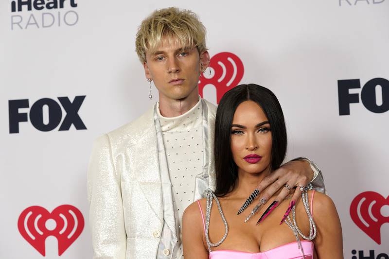 Rapper Machine Gun Kelly proposed to actress Megan Fox with a duo of emerald and diamond rings. AP