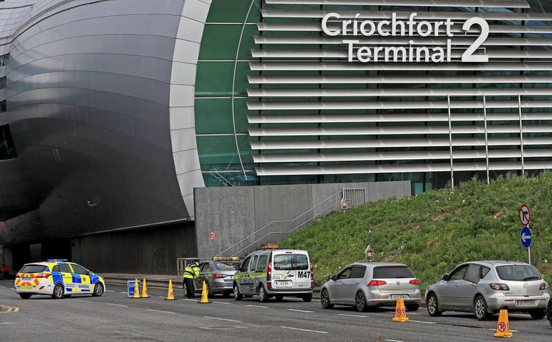 DUBLIN, IRELAND - MARCH 29: A view of security at Dublin airport on March 29, 2021 in Dublin, Ireland. Last week, Ireland started requiring travelers from 33 high-risk countries to be shuttled to a mandatory 12-day hotel quarantine. Over the weekend, three quarantined travelers absconded from their hotel, forcing authorities to track them down. (Photo by Donall Farmer/Getty Images)