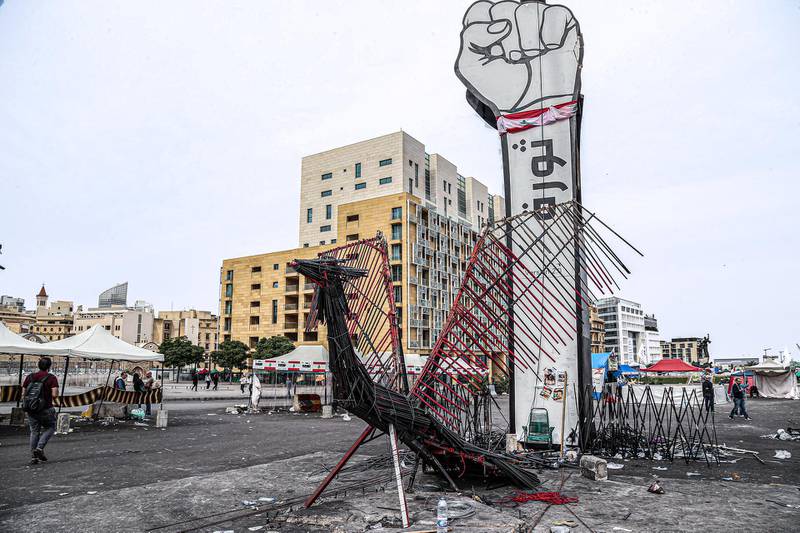 A sculpture made out metals from protesters  tent camps is displayed at the Martyrs' Square in downtown Beirut.  EPA