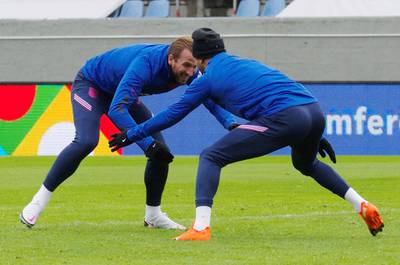 England's Harry Kane, left, with Kyle Walker during a training session in Iceland on Monday, September 7. Reuters