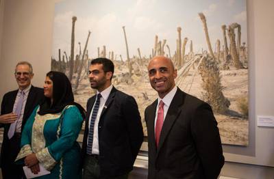 Yousef Al Otaiba, right, UAE Ambassador to the US, at the launch of the Emirati art exhibition in Washington. Evelyn Hockstein for The National