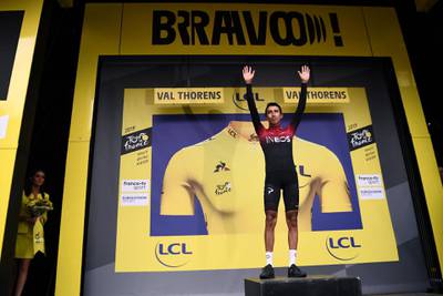 Colombia's Egan Bernal celebrates on the podium after the 20th stage between Albertville and Val Thorens, in Val Thorens, on July 27, 2019.  AFP