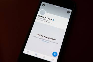 The suspended Twitter account of US President Donald Trump on a smartphone in Washington, on January 9, 2021. Bloomberg