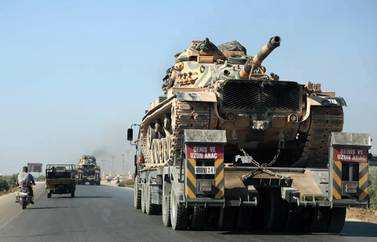A convoy of Turkish military vehicles reportedly heading towards the town of Khan Sheikhoun, which the Syrian Observatory of Human Rights says has now fallen to regime forces.​​​​ AFP 