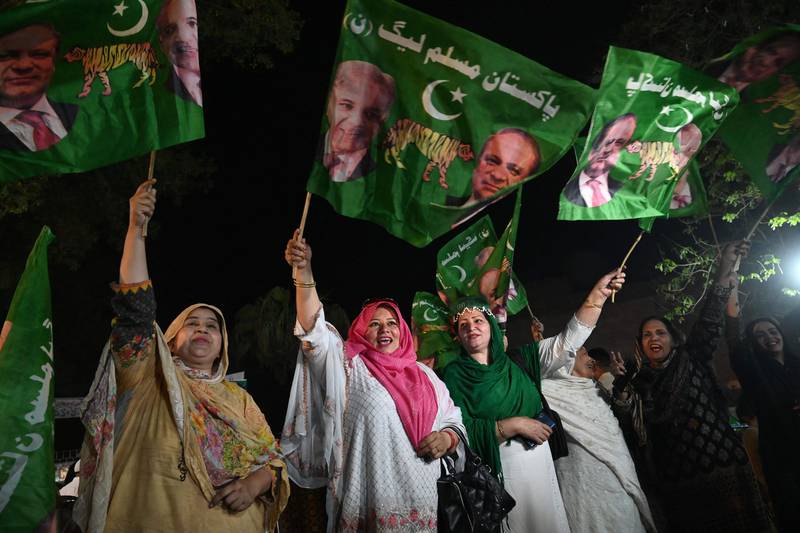 Jubilant Sharif supporters gather near the office of his party, Pakistan Muslim League (Nawaz), in Lahore on Monday. AFP