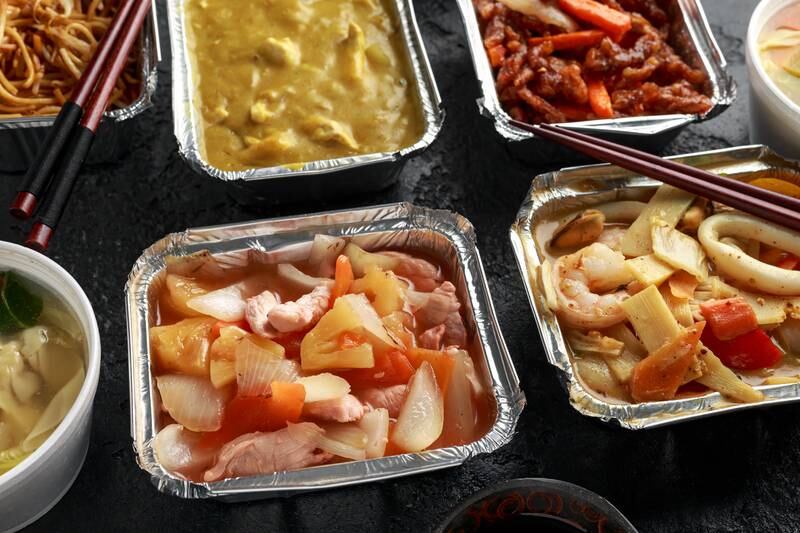 The traditional British-Chinese takeaway is under fire on social media as users criticise the inclusion of curry sauce and chips. Getty Images