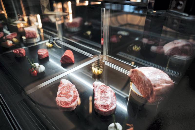The entrance of the new Dubai steakhouse has a meat station as well as a retail area.