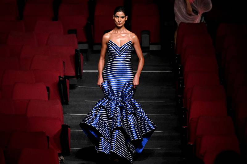 A model presents a blue number by Amit Aggarwal.