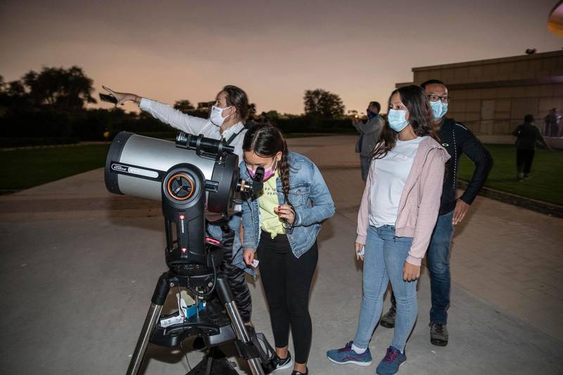 DUBAI UNITED ARAB EMIRATES. 21 DECEMBER 2020. The first ‘Christmas Star’ in 800 years appears in the UAE skies in a rare celestial even. The public gets to witness this event at the Al Thuraya Astronomy Centre in Mushrif Park.  (Photo: Antonie Robertson/The National) Journalist: Sarwat Nasir. Section: National.