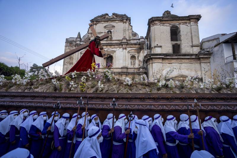Worshipers carry a religious float with an image of Jesus Christ during a Good Friday procession in Antigua, Guatemala. AP Photo