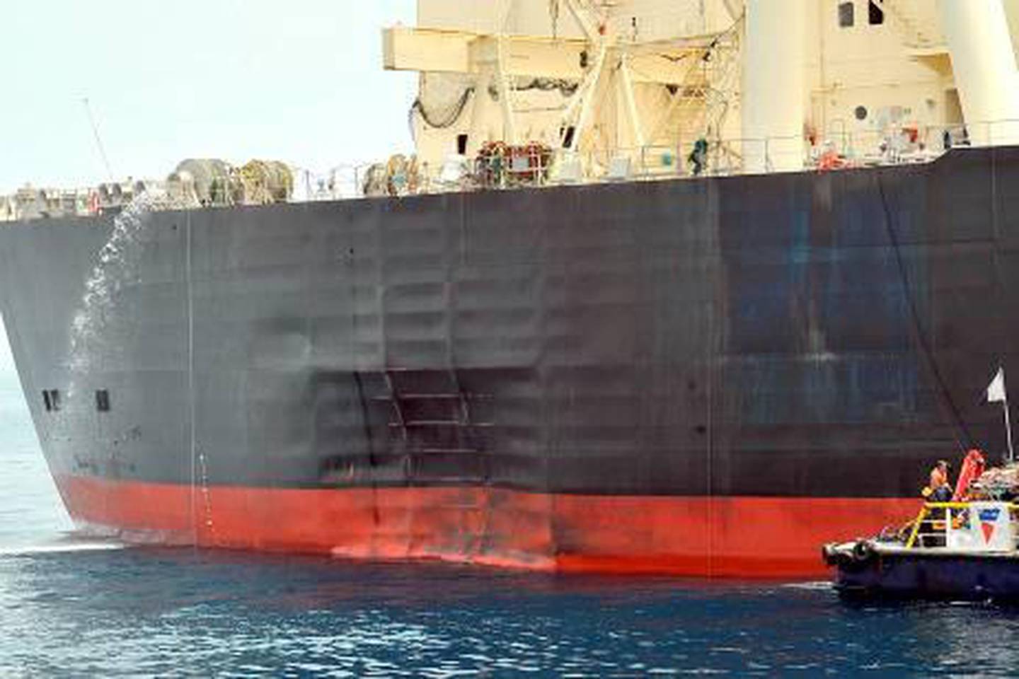 (FILES) -- A handout picture from the Emirati News Agency (WAM) released July 29, 2010 shows the Japanese oil tanker M Star of the Mitsui OSK Lines as it arrives at the Emirati port of Fujairah on July 28, 2010 after a mysterious explosion hit the tanker in the vital Strait of Hormuz. A "terrorist act" caused damage to a Japanese oil tanker in the Strait of Hormuz earlier this week, the coastguard in the United Arab Emirates, where the ship docked for repairs, said on August 6, 2010.  AFP PHOTO/HO/WAM  == RESTRICTED TO EDITORIAL USE == *** Local Caption ***  142963-01-08.jpg