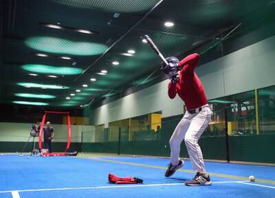 The father and son duo get some batting practice in. Chris Whiteoak/The National