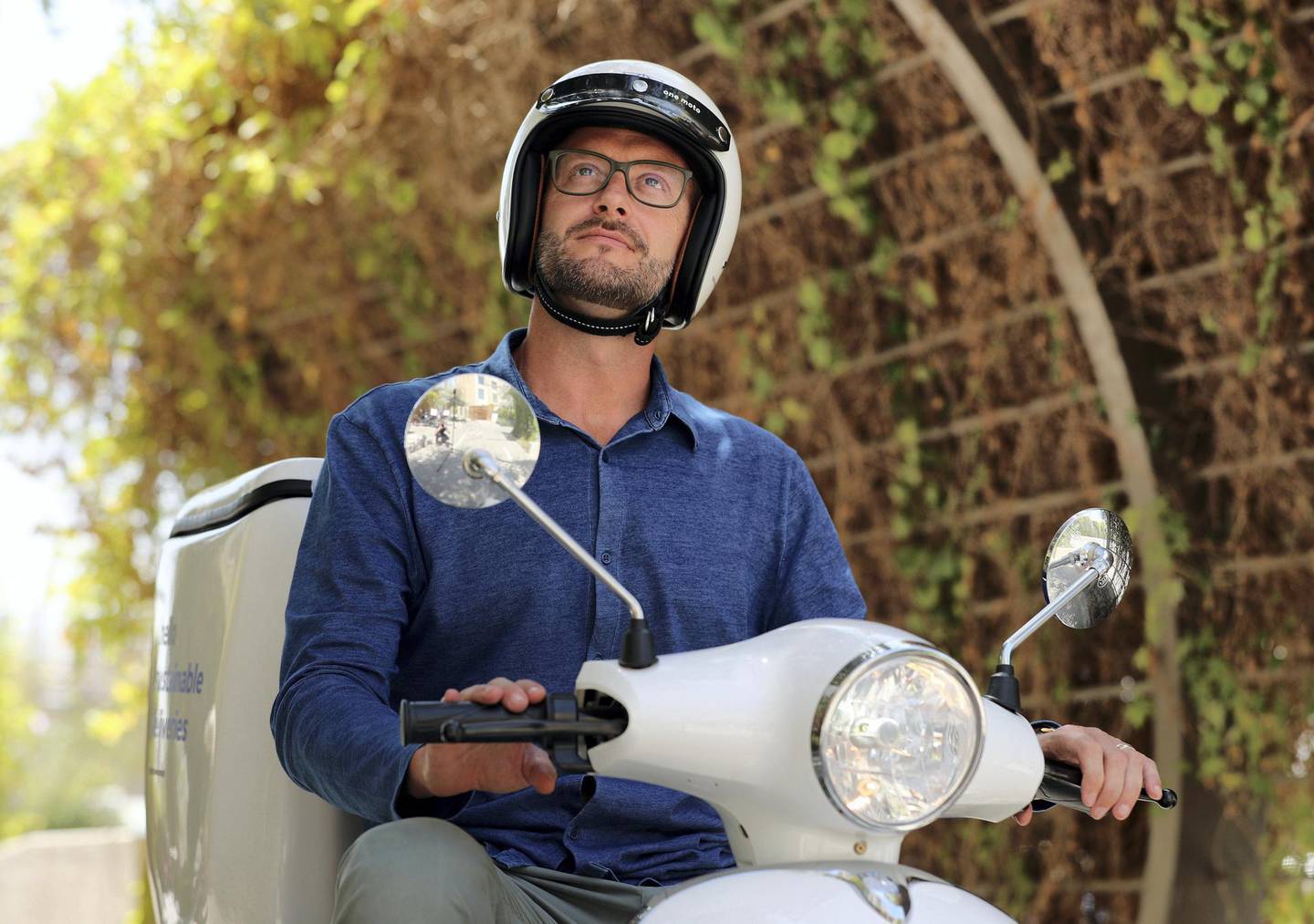 Dubai, United Arab Emirates - Reporter: Nick Webster. News. Adam Ridgeway delivers food on a moped for a week to see what life is like for delivery drivers, he’s trying to encourage use of electric scooters. Wednesday, April 7th, 2021. Dubai. Chris Whiteoak / The National
