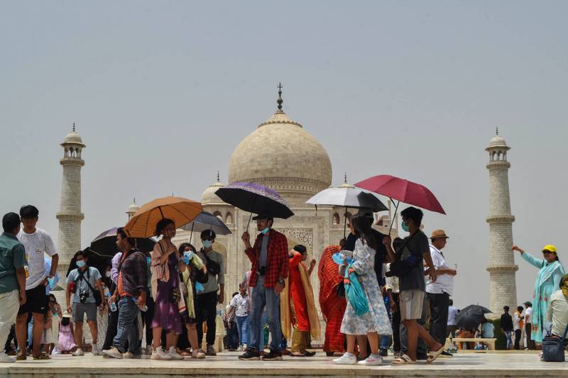 Tourists at the Taj Mahal in India. In OECD countries in the Asia Pacific region, tourist arrivals were at least 40 per cent lower in July 2022 than in July 2019. AFP