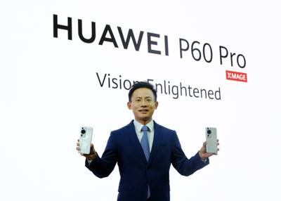 Pablo Ning, president of the Huawei Consumer Business Group in the Middle East and Africa, with the P60 smartphones in Dubai on Wednesday. Photo: Huawei