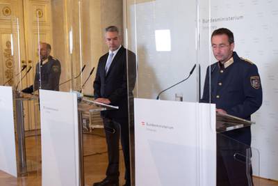Austria's Interior Minister Karl Nehammer, centre,, the head of the Austrian Federal Police Franz Ruf, left, and Vienna police chief Gerhard Puerstl address a press conference in Vienna. AFP