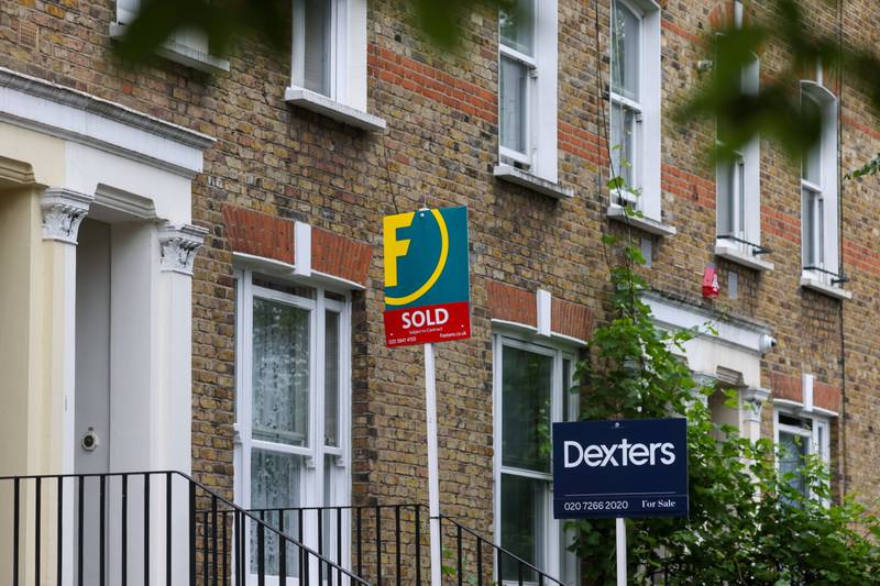 Estate agents' signs outside residential properties in the Maida Vale district of London, as mortgage lender Halifax predicts a slowdown in the market. Bloomberg
