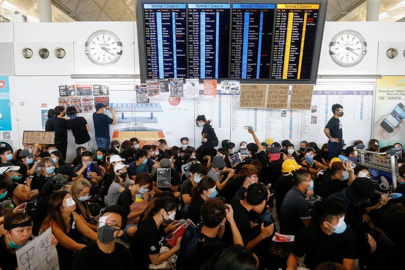 Anti-extradition bill protesters rally at the departure hall of Hong Kong airport in Hong Kong, China.  Reuters