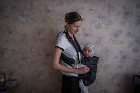 A Ukrainian refugee mother with her baby in Chisinau. Getty