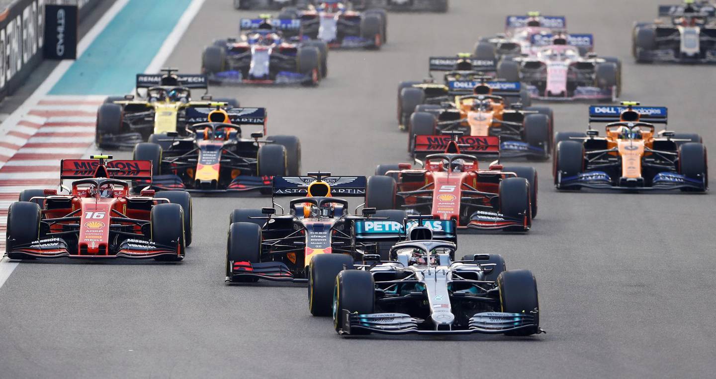 FILE PHOTO: Formula One F1 - Abu Dhabi Grand Prix - Yas Marina Circuit, Abu Dhabi, United Arab Emirates - December 1, 2019   Mercedes' Lewis Hamilton leads at the start of the race   REUTERS/Hamad I Mohammed/File Photo