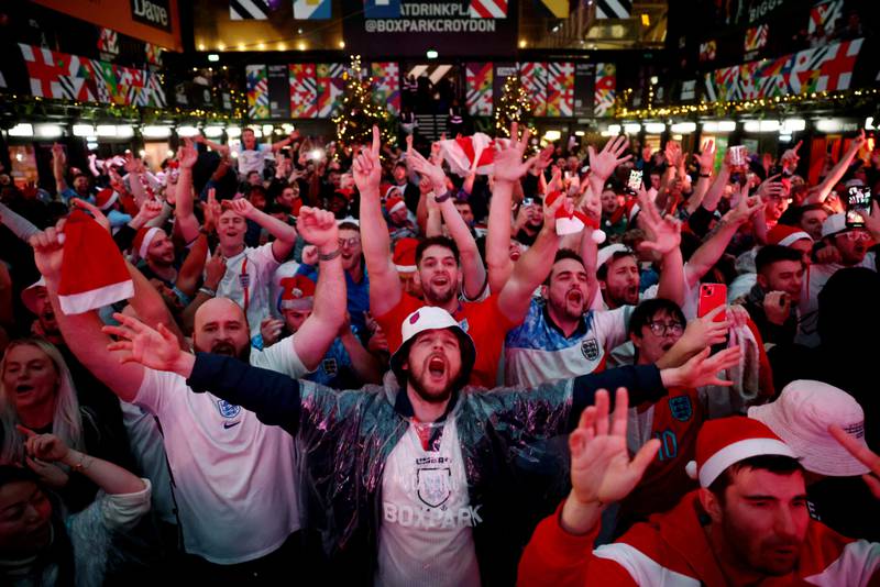 England fans during the match against Senegal. They will be hoping the team can overcome France on Saturday. Reuters
