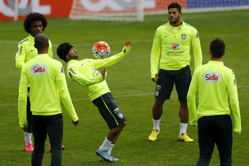 Brazil's Dani Alves controls the ball during a team training session in Santiago on Monday ahead of their Thursday World Cup qualifying match against Chile. Ivan Alvarado / Reuters / October 5, 2015 