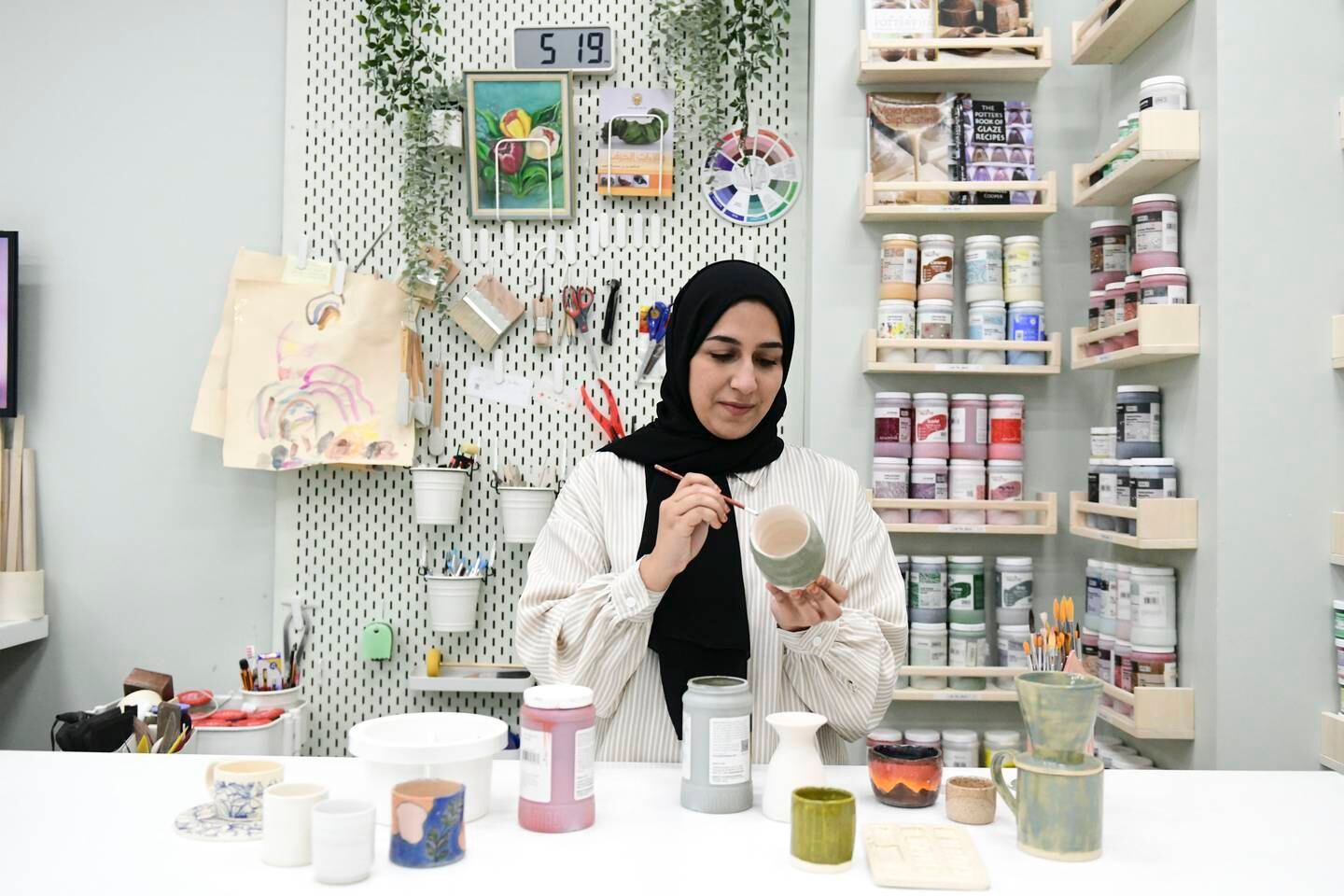 Sarah Al Hosani produces cups, plates and bowls for coffee shops and restaurants in the UAE. Khushnum Bhandari / The National