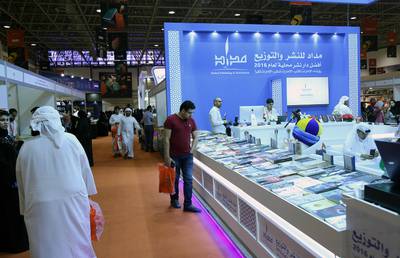 Sharjah, 03, Nov, 2017: Visitor take a look at the books during the Sharjah International Book Fair at the Sharjah Expo Centre in Sharjah. Satish Kumar for the National / Story by Saeed Saeed