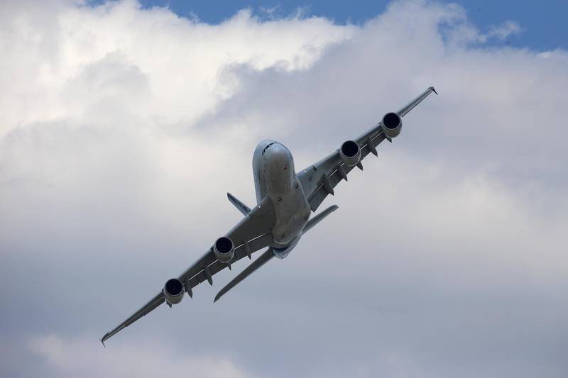 FILE: An Airbus SAS A380 super jumbo performs a flying display on day two of the 51st International Paris Air Show in Paris, France, on Tuesday, June 16, 2015. Airbus SE, the France-based aerospace giant, which employs 14,000 people in Britain, where it manufacturers wings, said late Thursday that if Prime Minister Theresa May fails to broker an exit deal, it would lead to “severe disruption and interruption of U.K. production.” Airbus would be forced to “reconsider its investments in the U.K., and its long-term footprint in the country” if the country tumbled out of the bloc next year without a deal, the manufacturer said. Our editors select the best archive images on Airbus SE. Photographer: Jasper Juinen/Bloomberg
