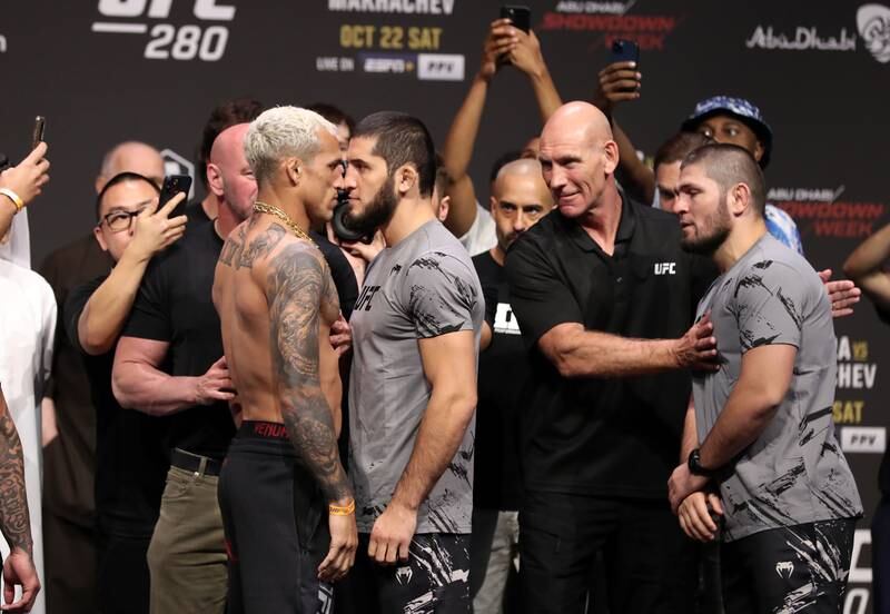 Charles Oliveira and Islam Makhachev at the ceremonial weigh in before their lightweight title fight at UFC 280 in Abu Dhabi. Chris Whiteoak / The National